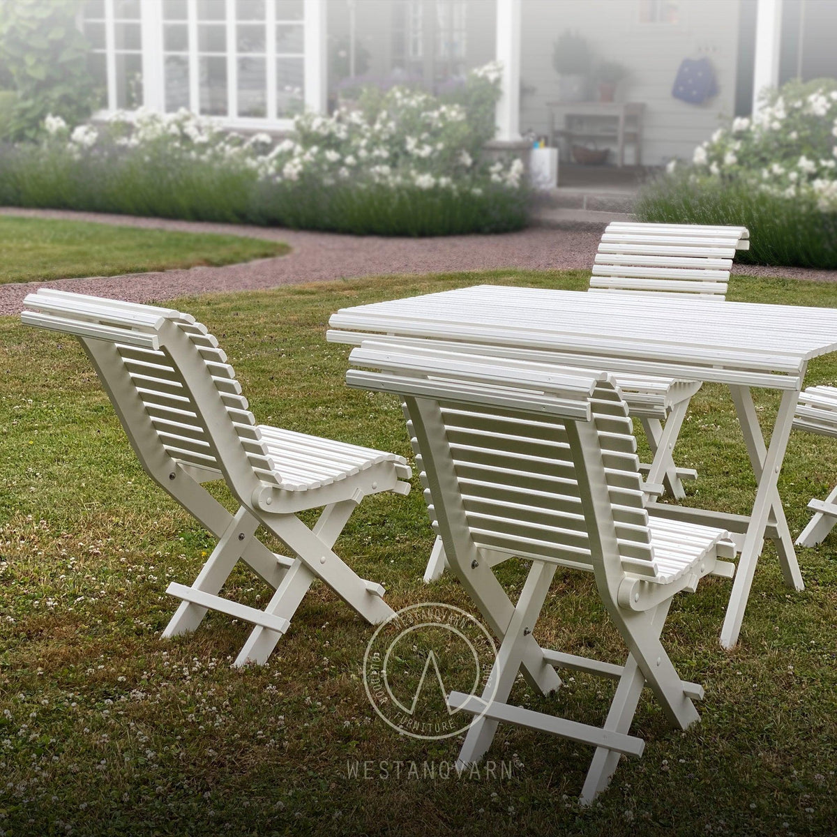 Valkoinen Sundborn garden table with chairs for outdoor use